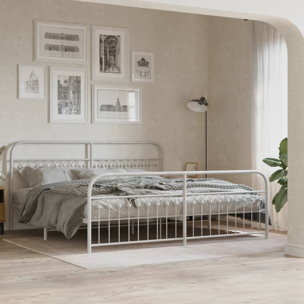 White metal bed frame with decorative headboard and footboard