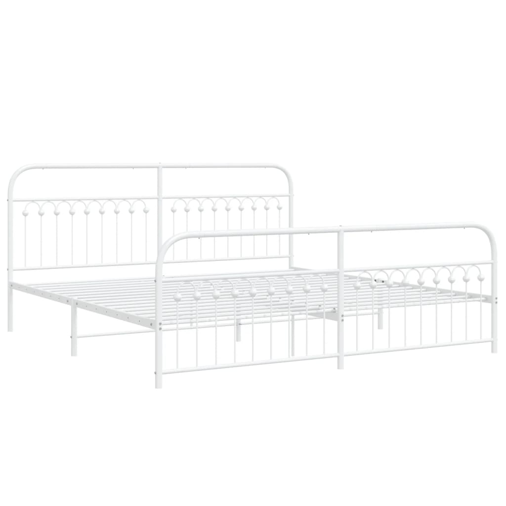 White metal twin bed frame with ornate headboard and footboard detail