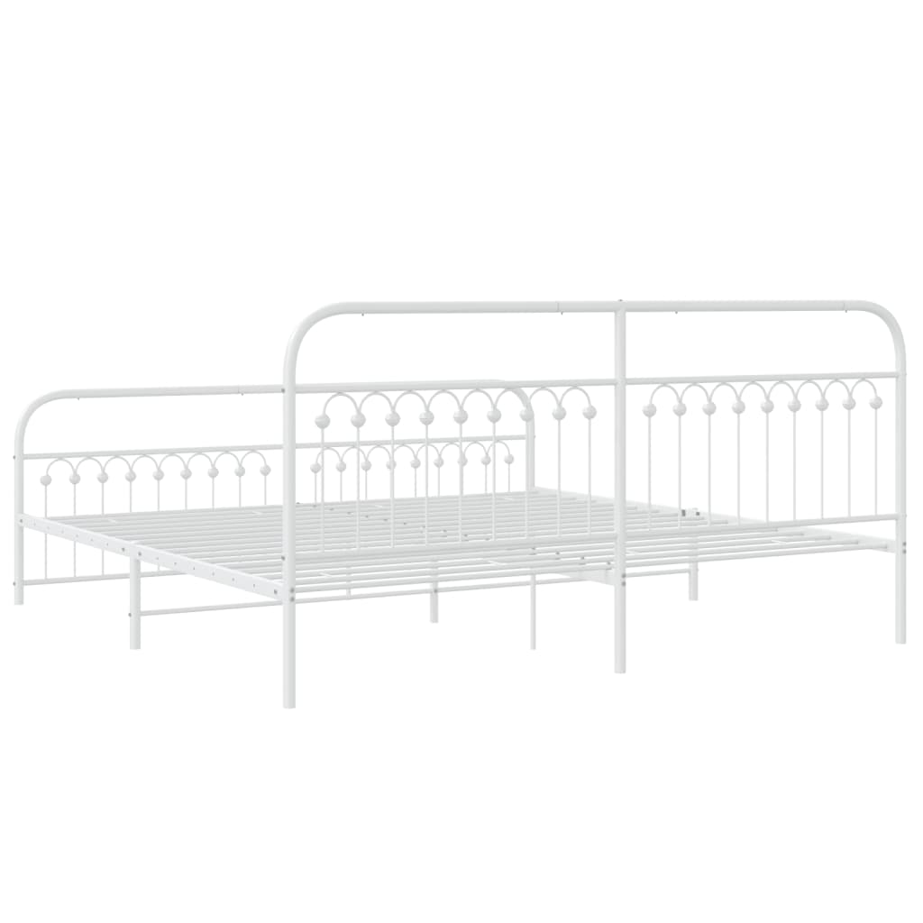 White metal twin bed frame with decorative headboard and footboard