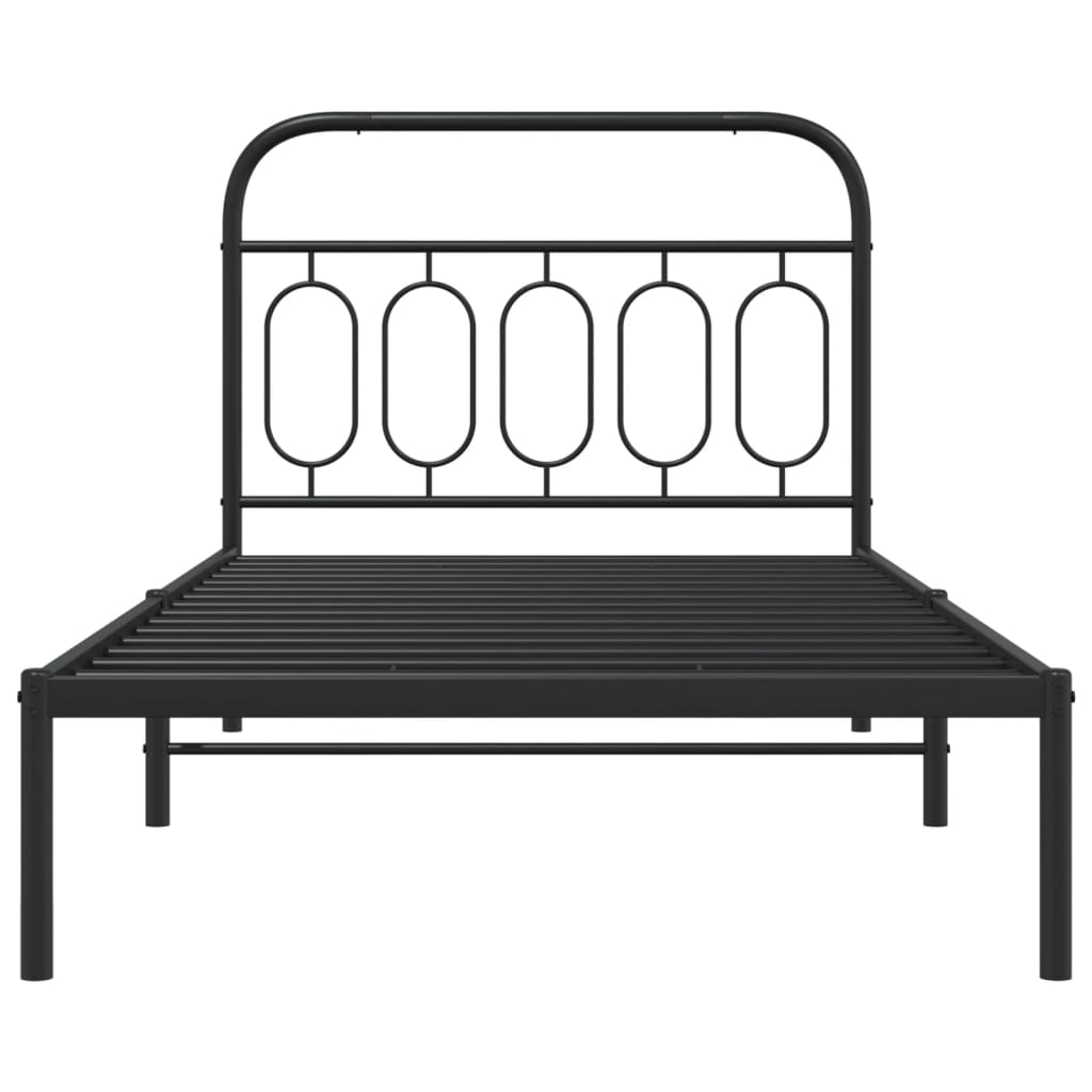 Black metal twin bed frame with oval headboard detail