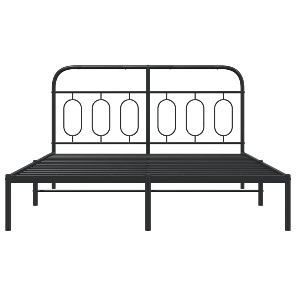 Black metal bed frame with arched headboard and oval accents