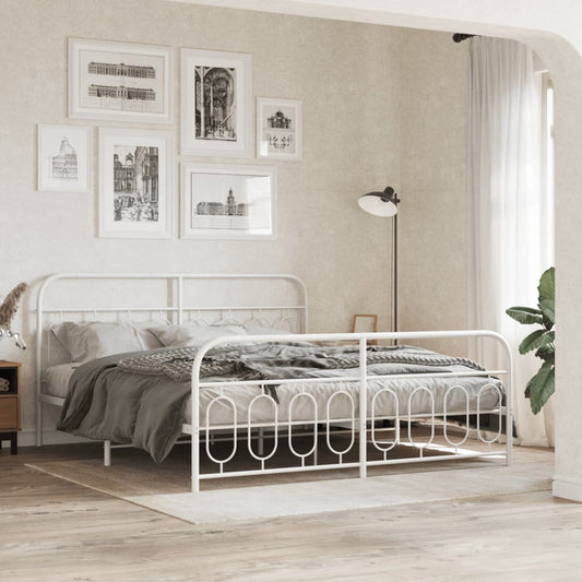 White metal platform bed with ornate headboard and footboard details