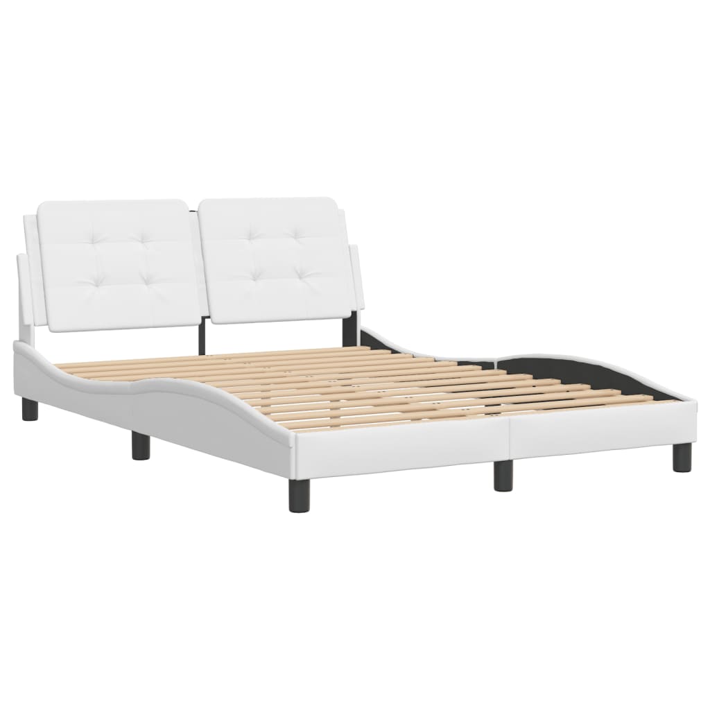 White tufted faux leather bed frame with curved sides and two pillows