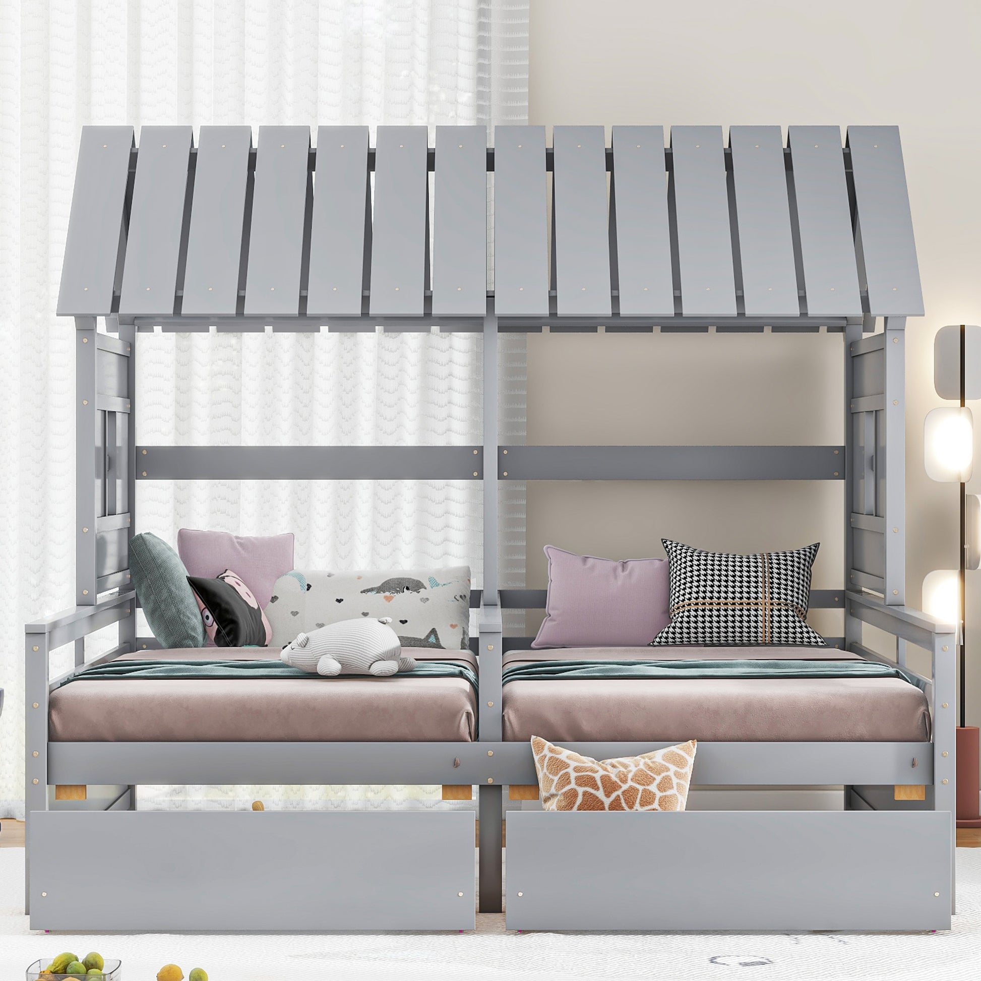 Gray wooden twin bunk bed with houseshaped roof for kids