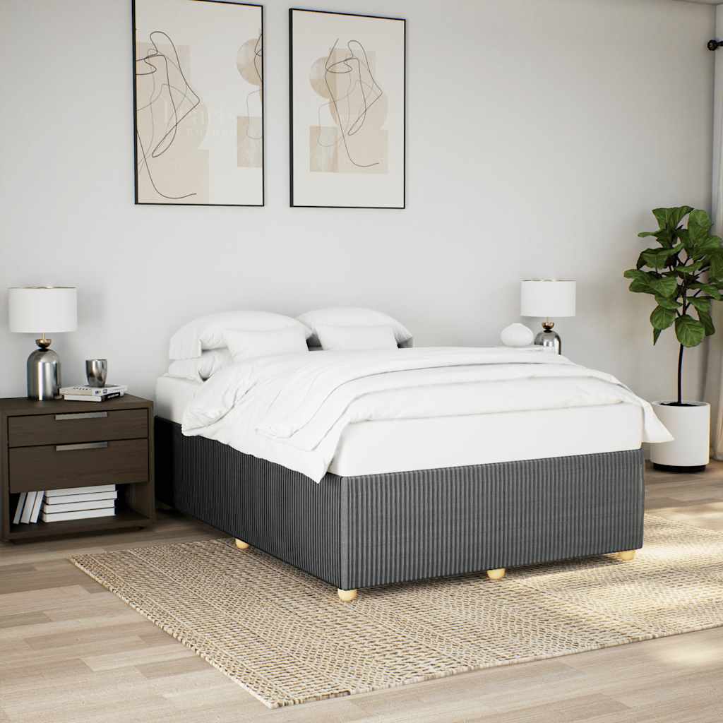 Dark grey striped divan bed base with white mattress and bedding