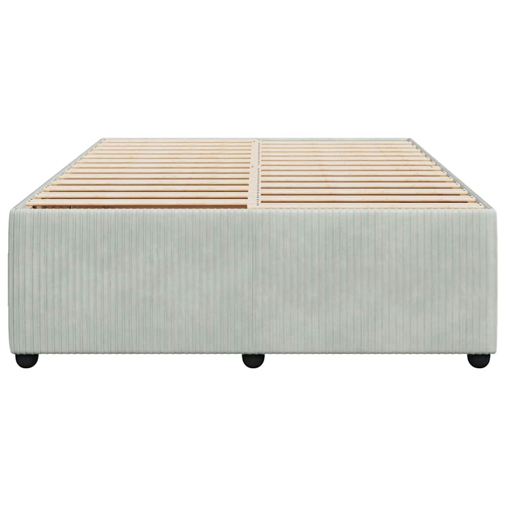 Light grey upholstered divan bed base with wooden slats