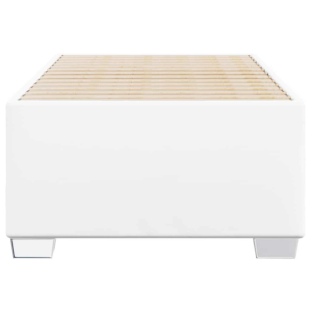 White upholstered bed frame with a wooden slat base and chrome legs