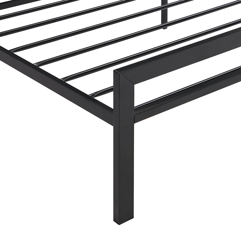 Black metal bed frame detail with square legs