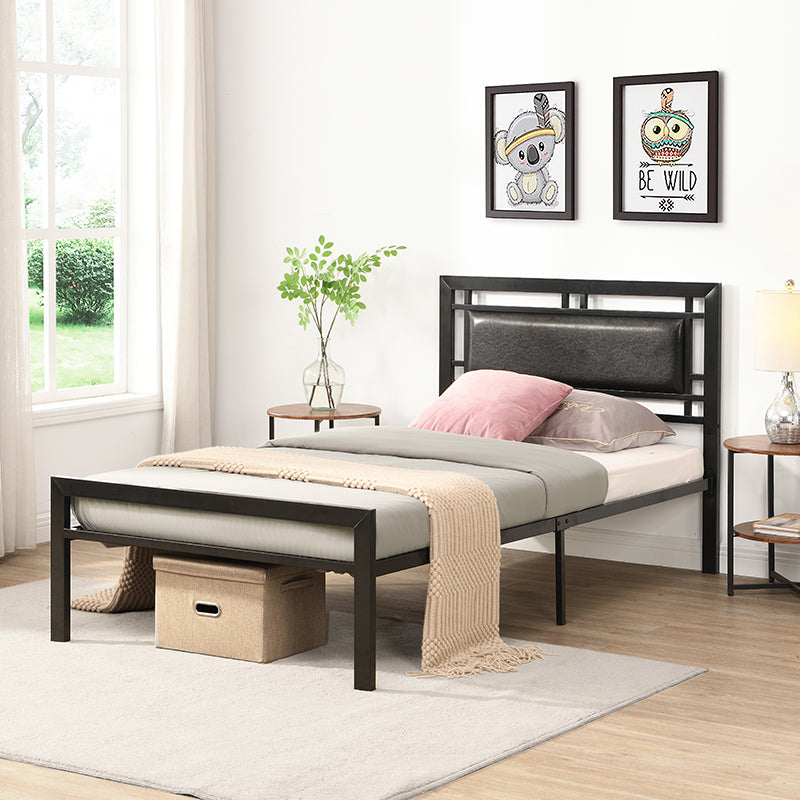 Black metal twin bed frame with upholstered headboard