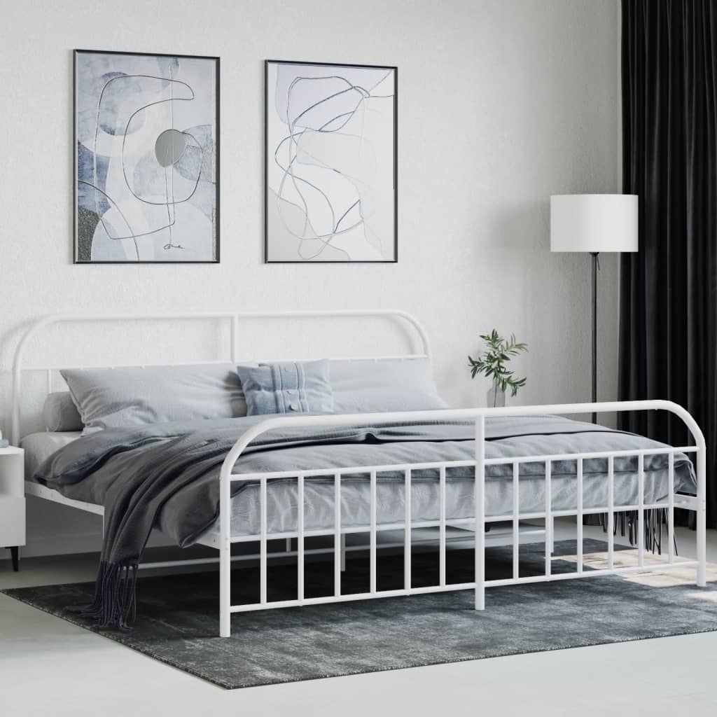 White metal twin bed frame with decorative headboard and footboard