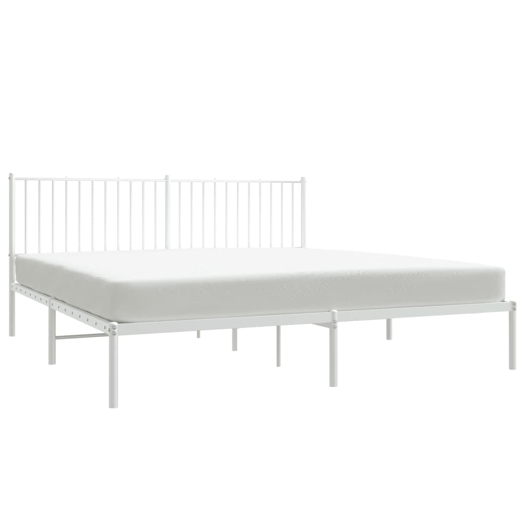 White metal platform bed frame with ridged headboard and upholstered mattress