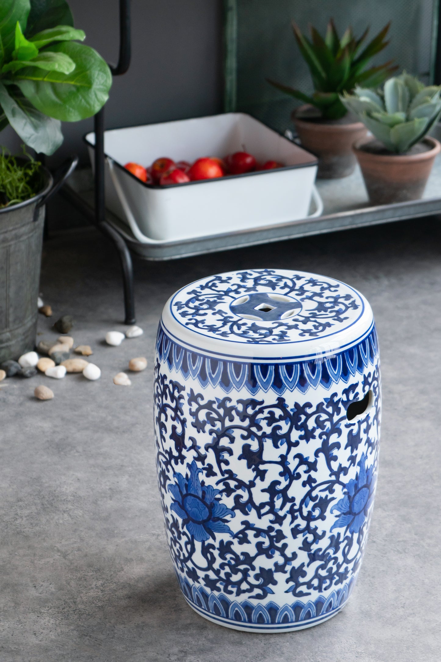 Blue and white ceramic garden stool with floral pattern