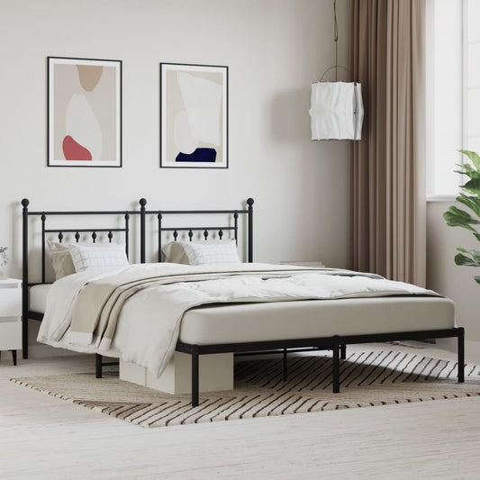 Black metal queen bed frame with ornate headboard and footboard