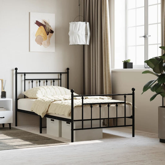 Black metal twin bed frame with decorative finials and slatted headboard