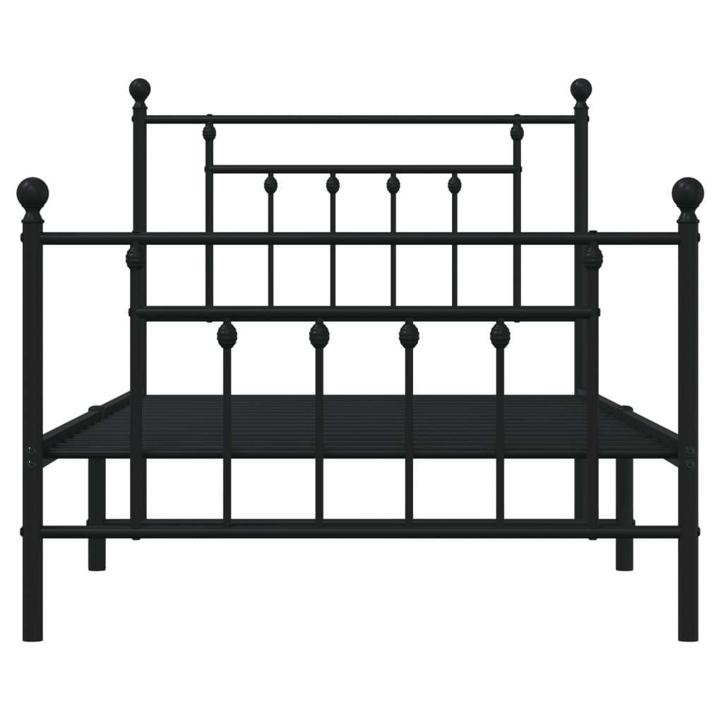 Black metal bed frame with white mattress