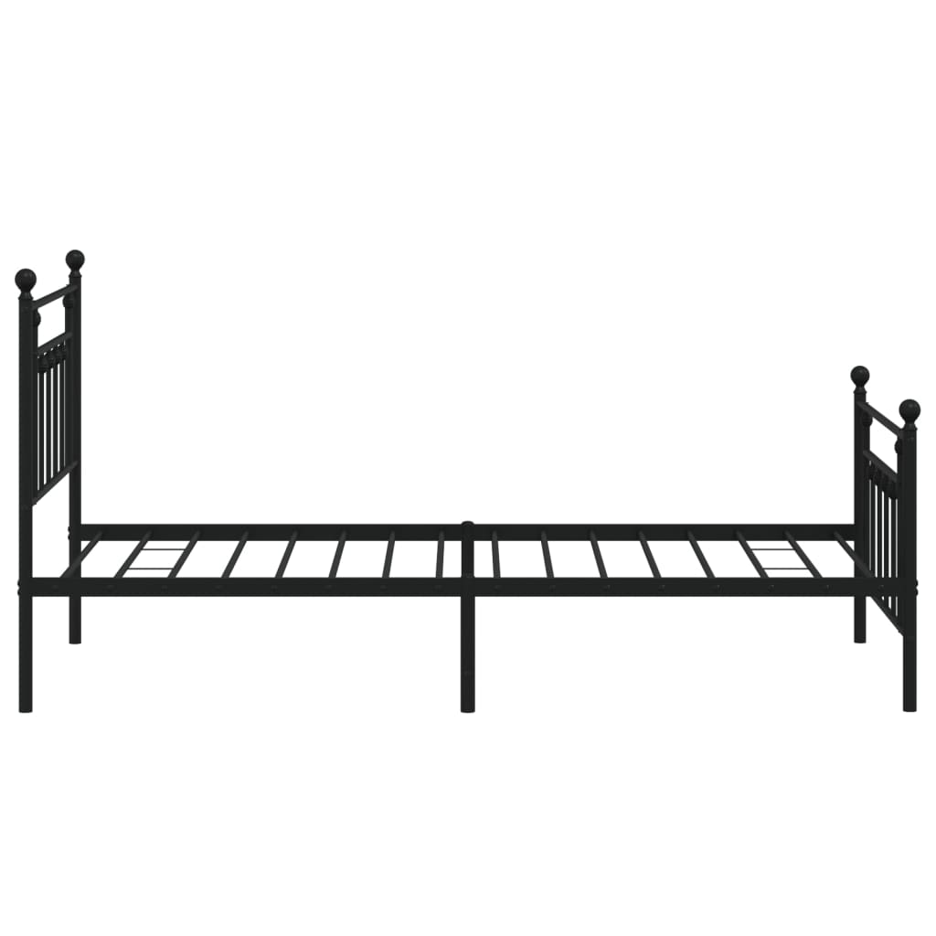 Black wrought iron bed frame with decorative finials