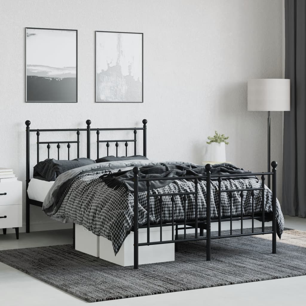 Black metal twin bed frame with ornate headboard
