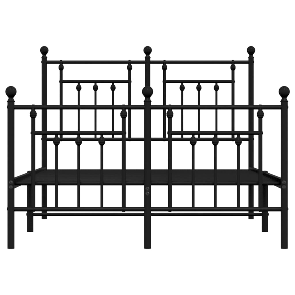 Black metal twin bed frame with ornate headboard and footboard