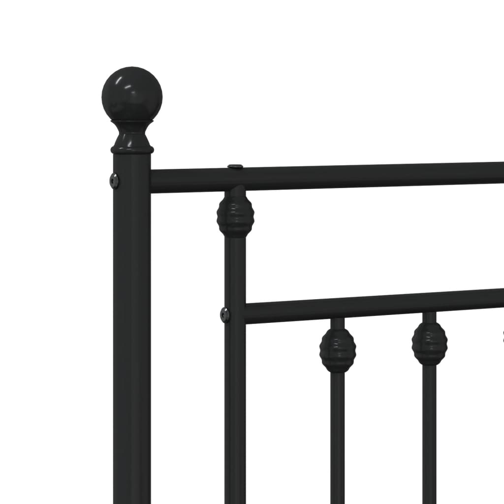 Black metal twin bed frame with decorative finials and vertical slats