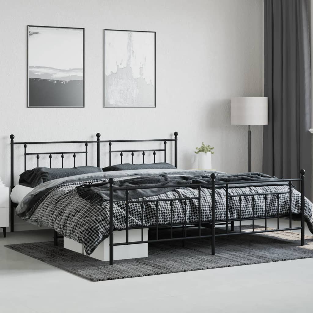 Black metal bed frame with decorative finials and slatted base