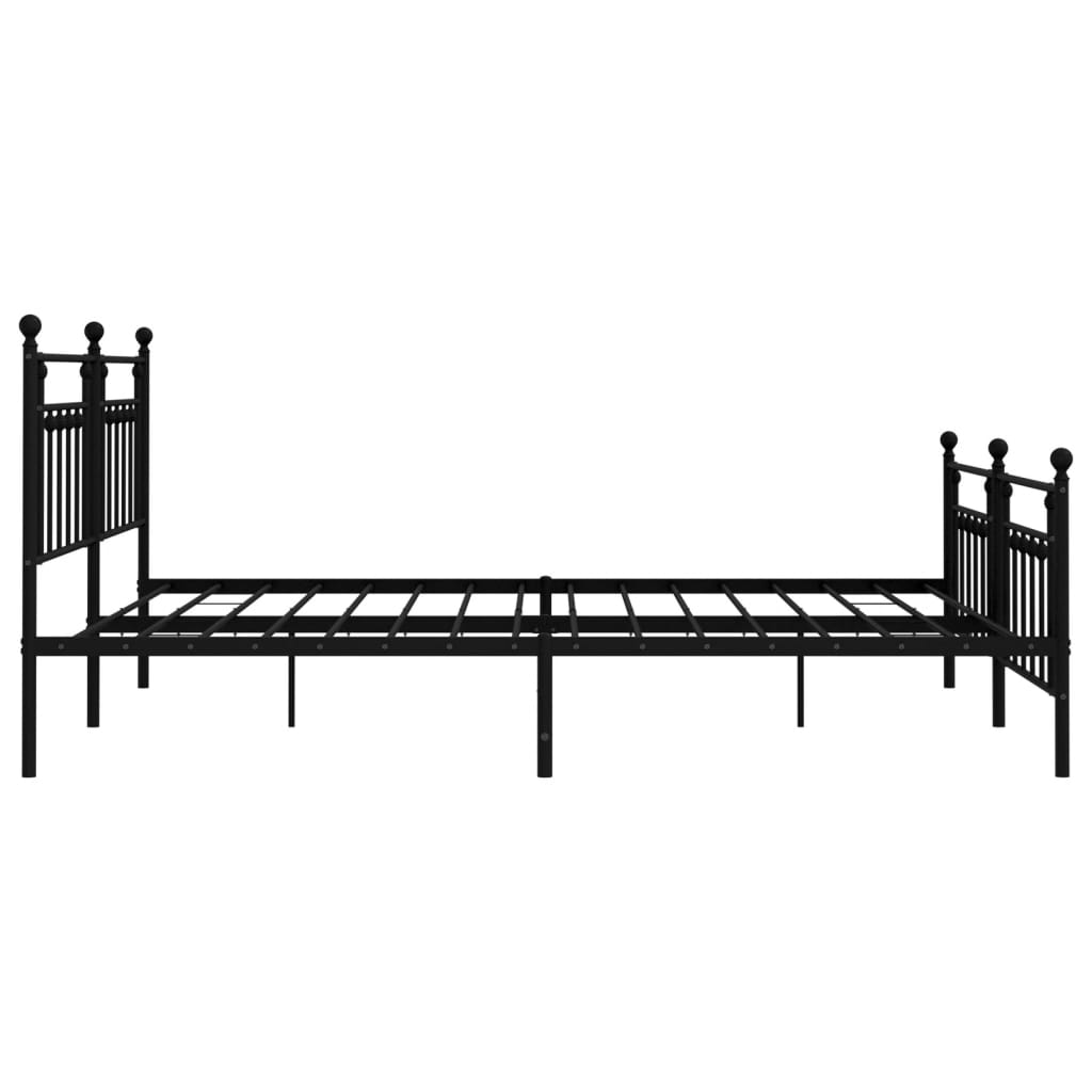 Black metal bed frame with intricate headboard and footboard detailing