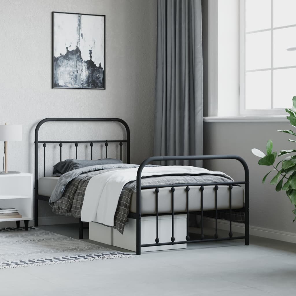 Black metal twin bed frame with decorative finials