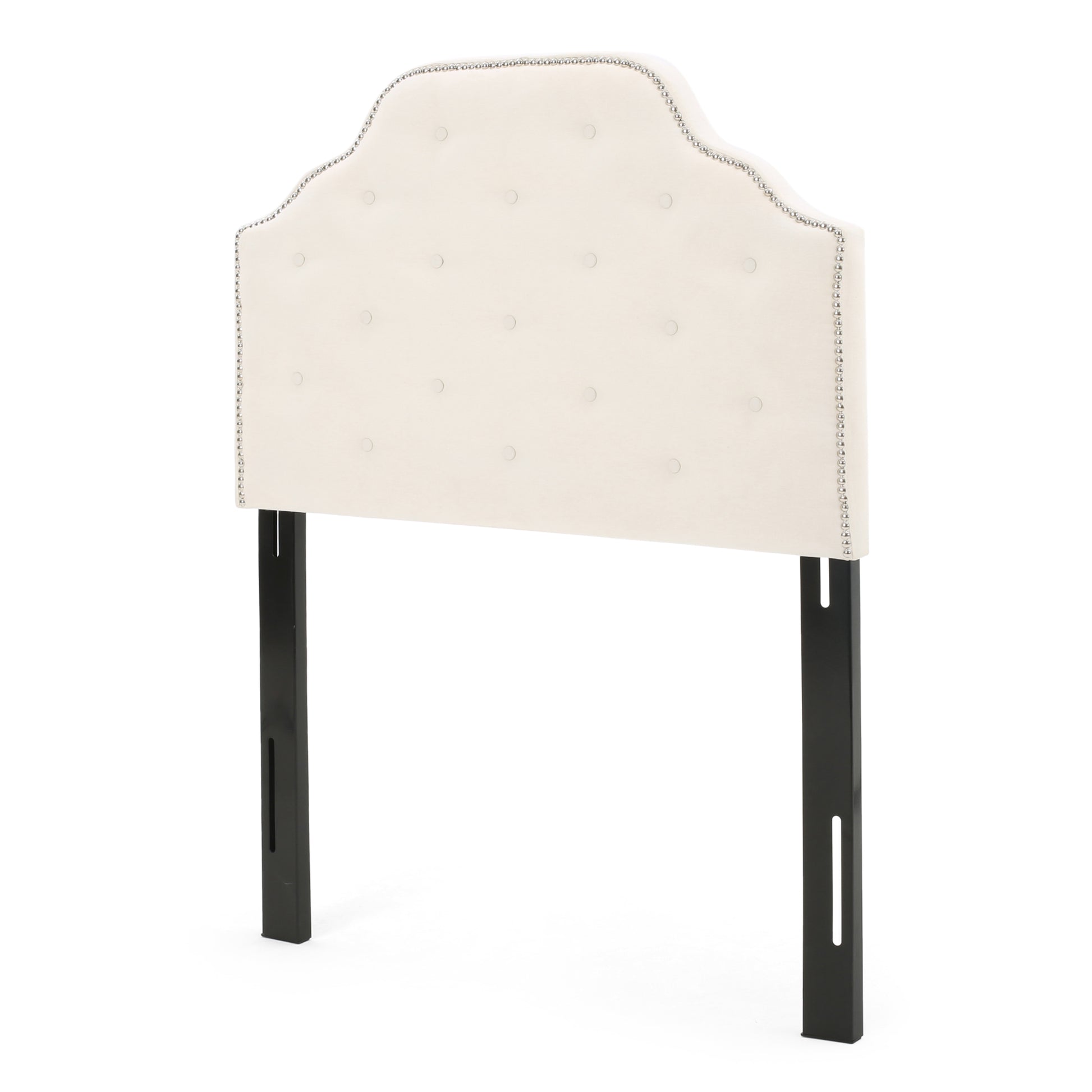 Cream velvet headboard with tufting and nailhead trim
