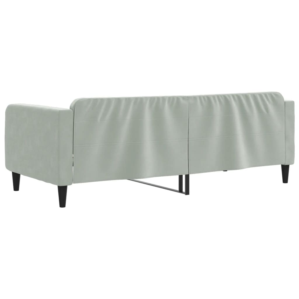 Light grey upholstered sofa side view with tapered black legs