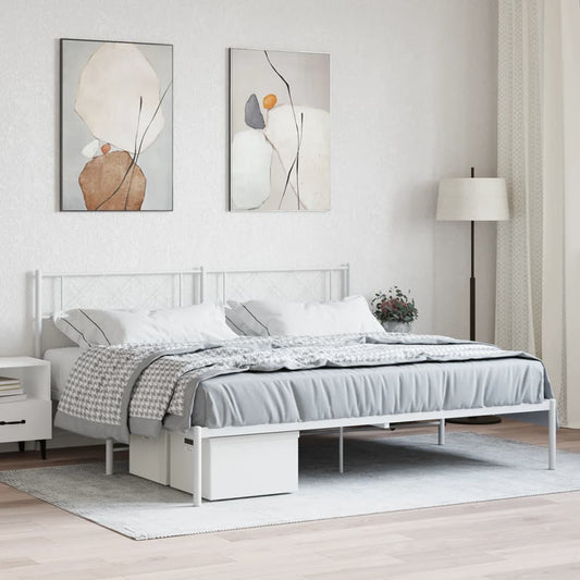 White metal bed frame with diamond pattern headboard and neutral bedding