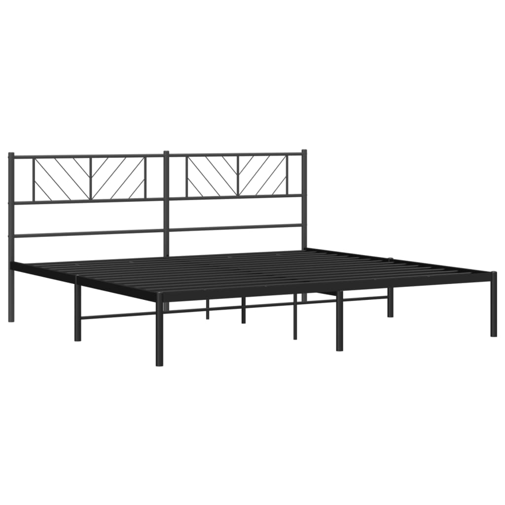 Black metal platform bed frame with decorative headboard detail