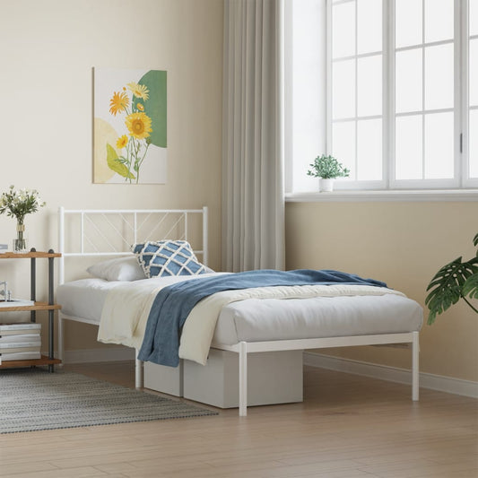 White metal twin bed frame with geometric headboard and integrated platform