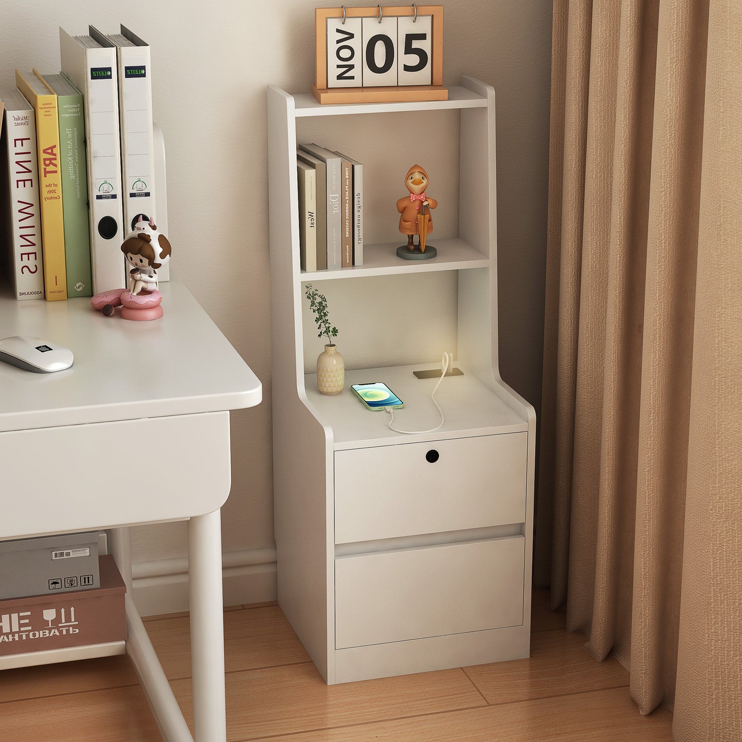 White bedside table with two drawers and a charging station