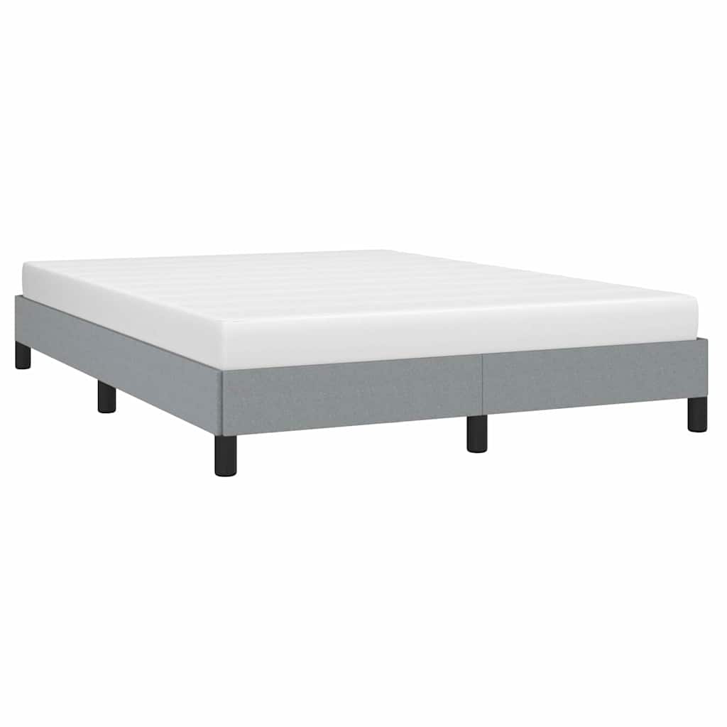 Gray upholstered twin bed frame with modern minimalist design