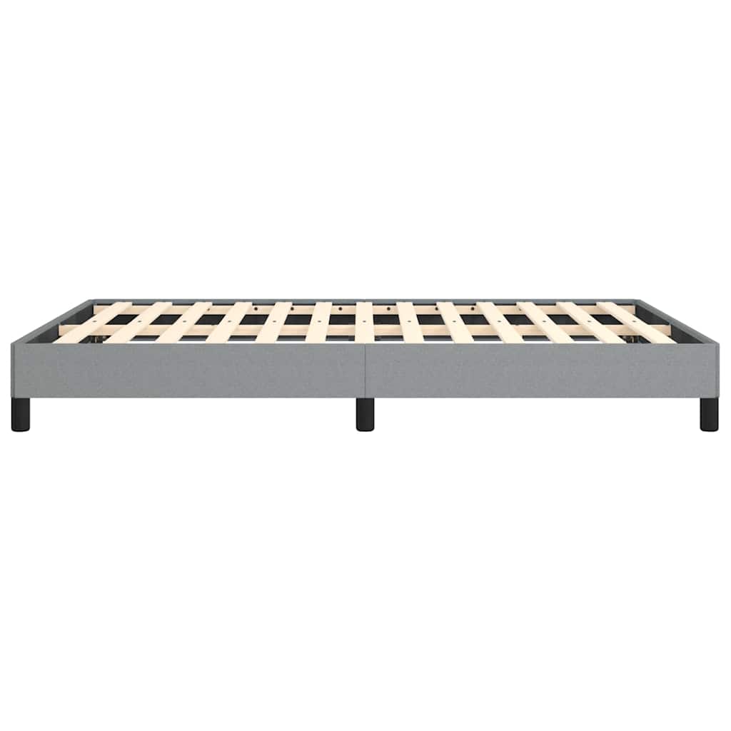 Grey upholstered bed frame with wooden slats