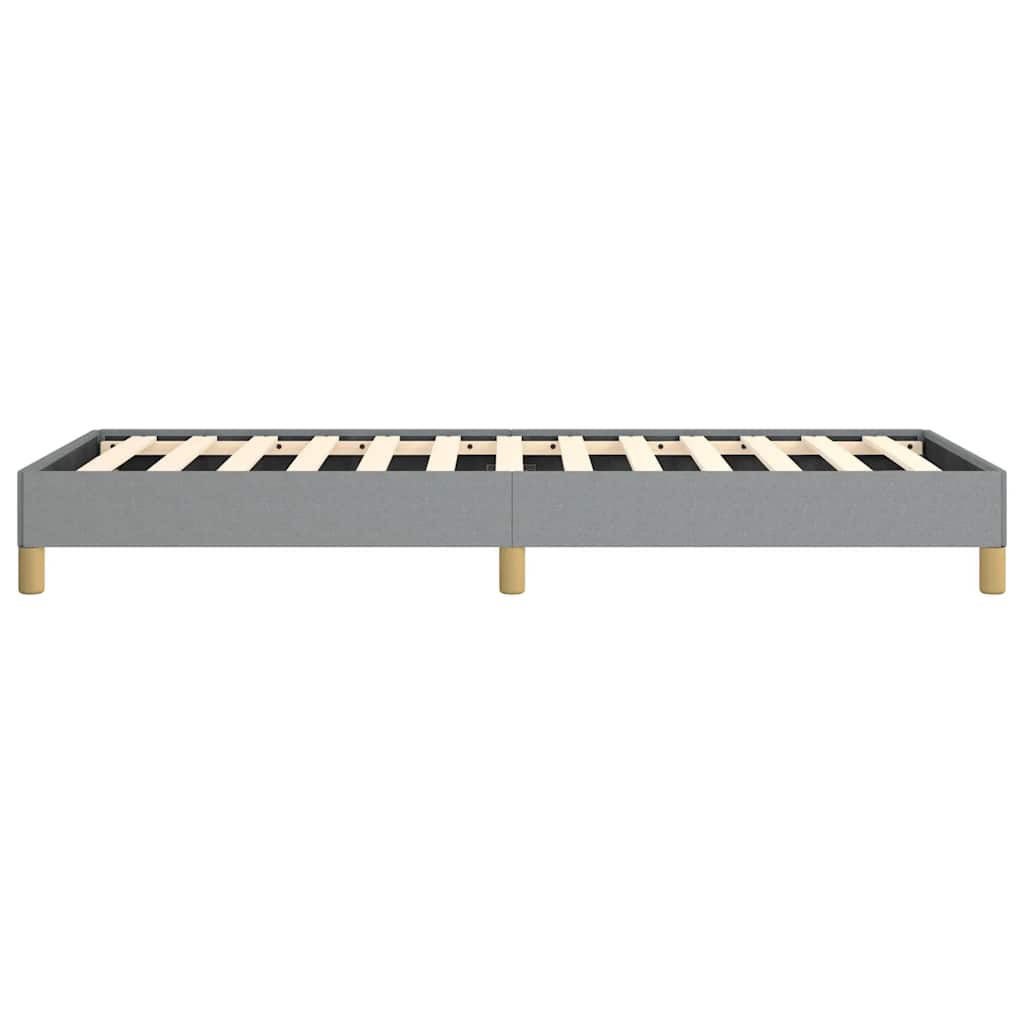 Gray upholstered platform bed frame with wooden slats and natural wood legs
