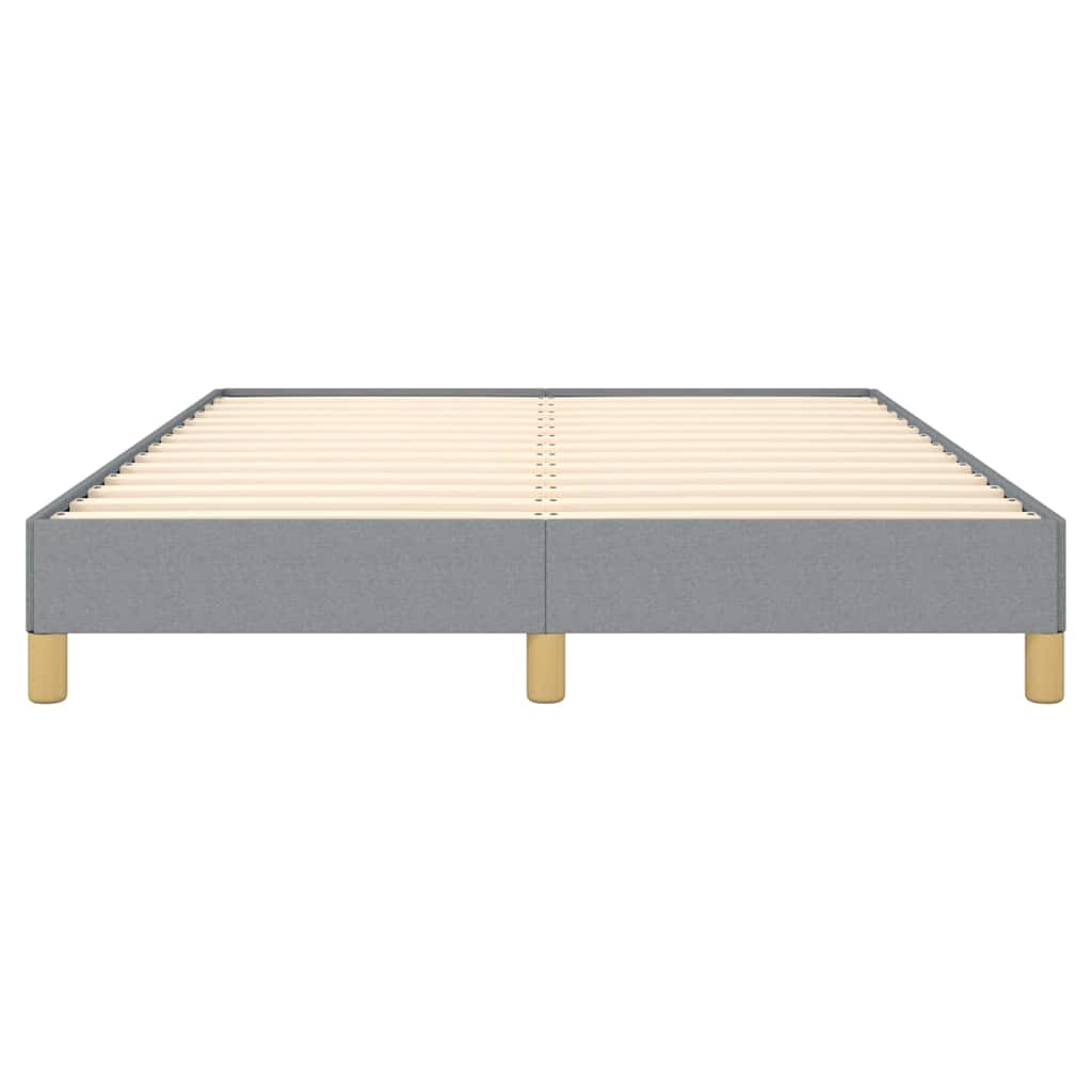 Grey fabric upholstered platform bed frame with natural wood slats and gold legs