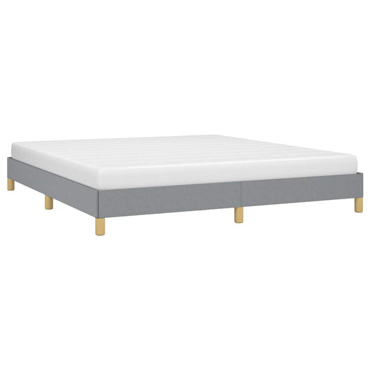 Modern grey upholstered bed frame with wooden legs