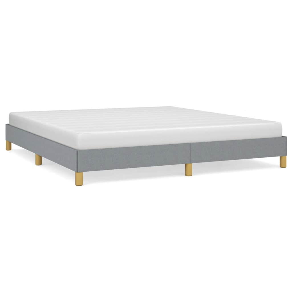 Diagram showing dimensions of a white platform bed frame