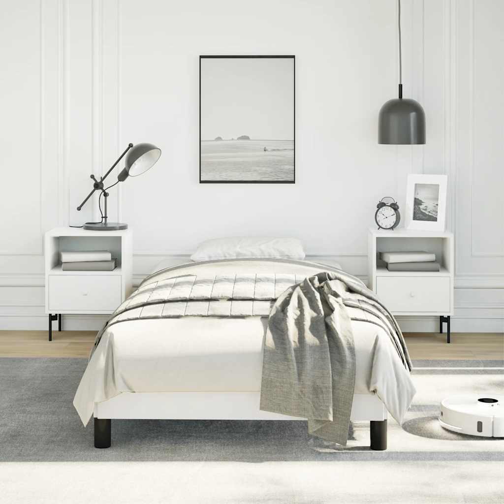 White modern single bed frame with black legs