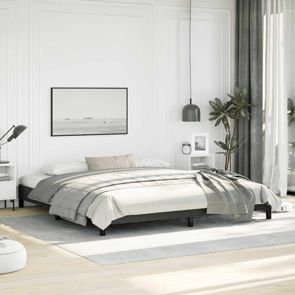 Black platform bed frame with white mattress
