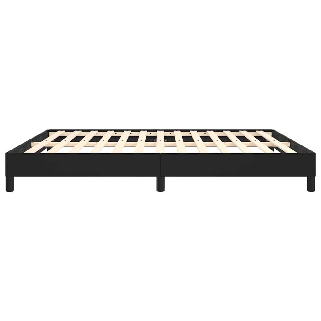 Lowprofile black metal bed frame with wooden slats for mattress support