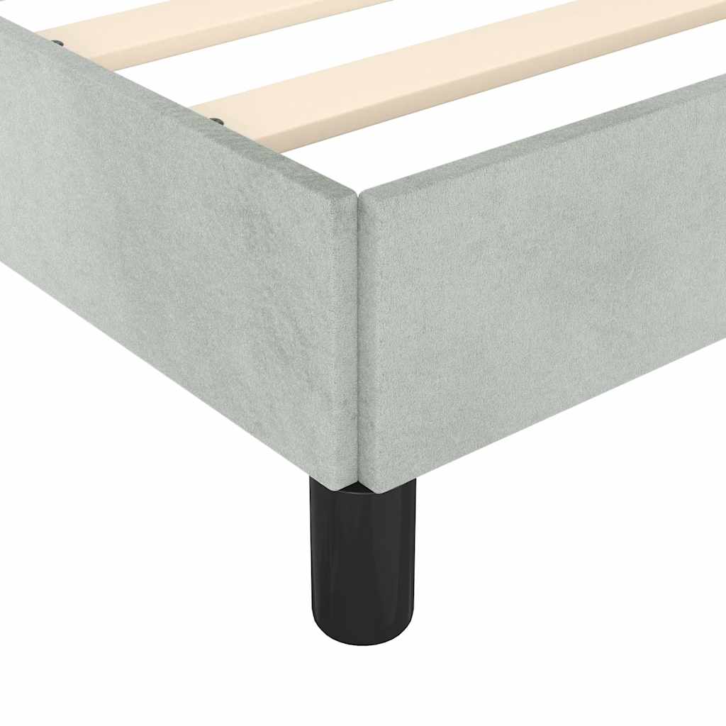 Light gray upholstered platform bed frame with wooden slats