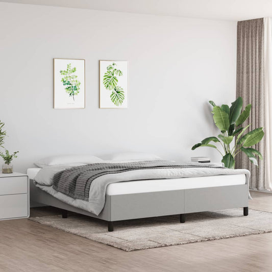 Grey upholstered platform bed frame with clean lines
