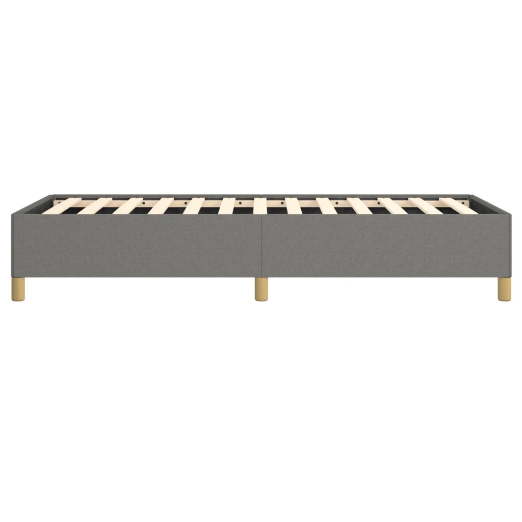 Gray upholstered bed frame with wooden slats and gold legs