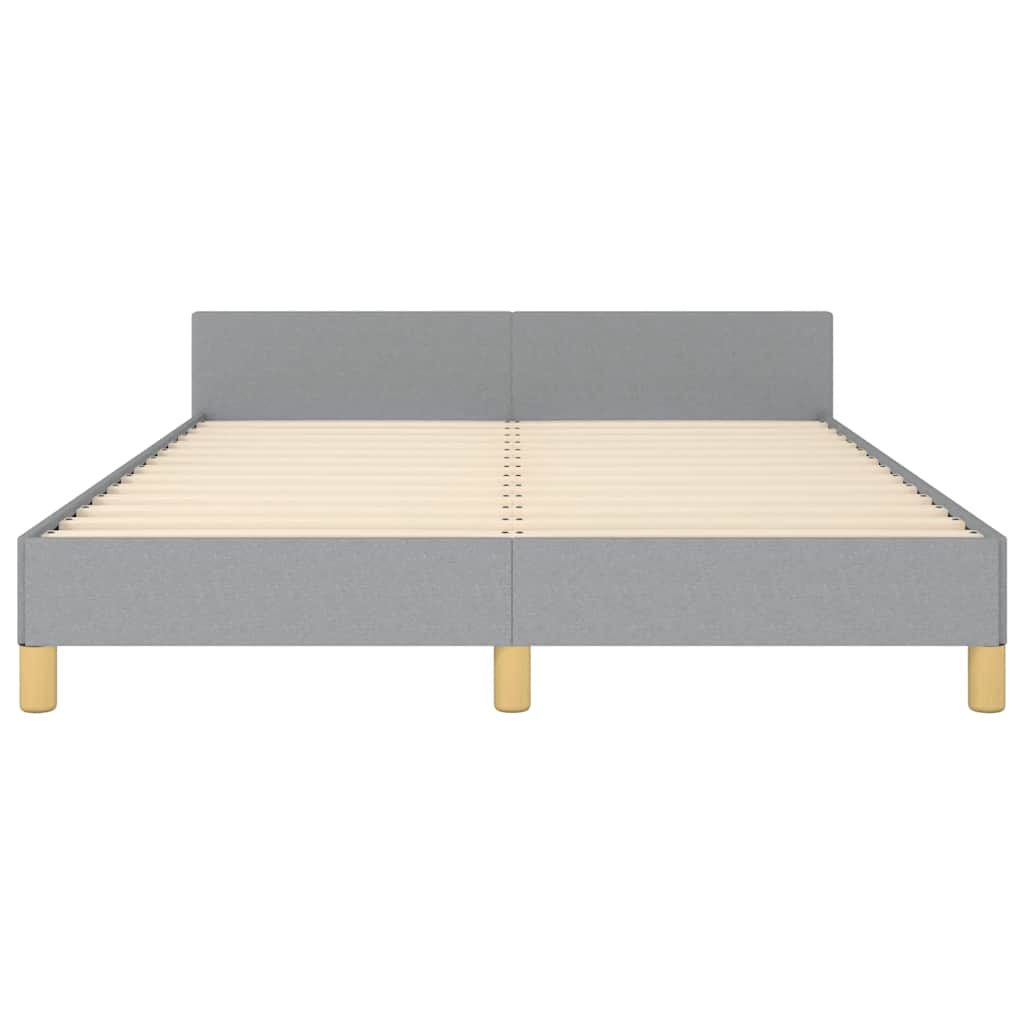 Modern grey fabric bed frame with white mattress and wooden legs