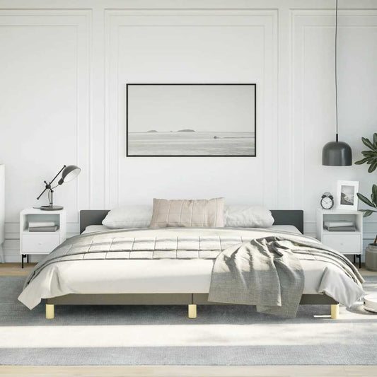 Modern platform bed frame in neutral gray with gold accents