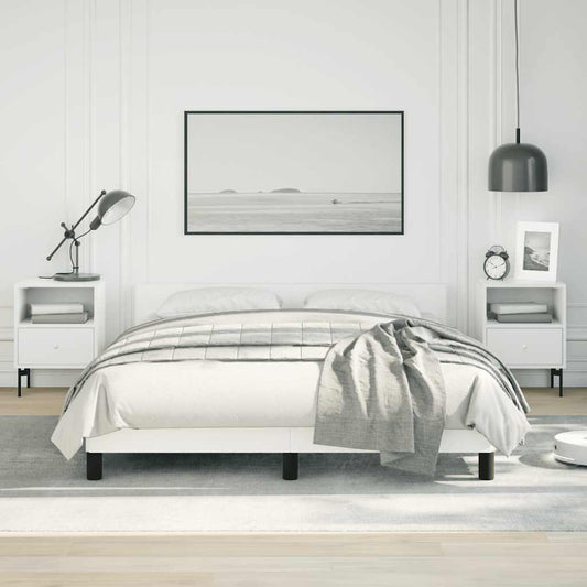 Modern white platform bed frame with upholstered headboard and clean lines