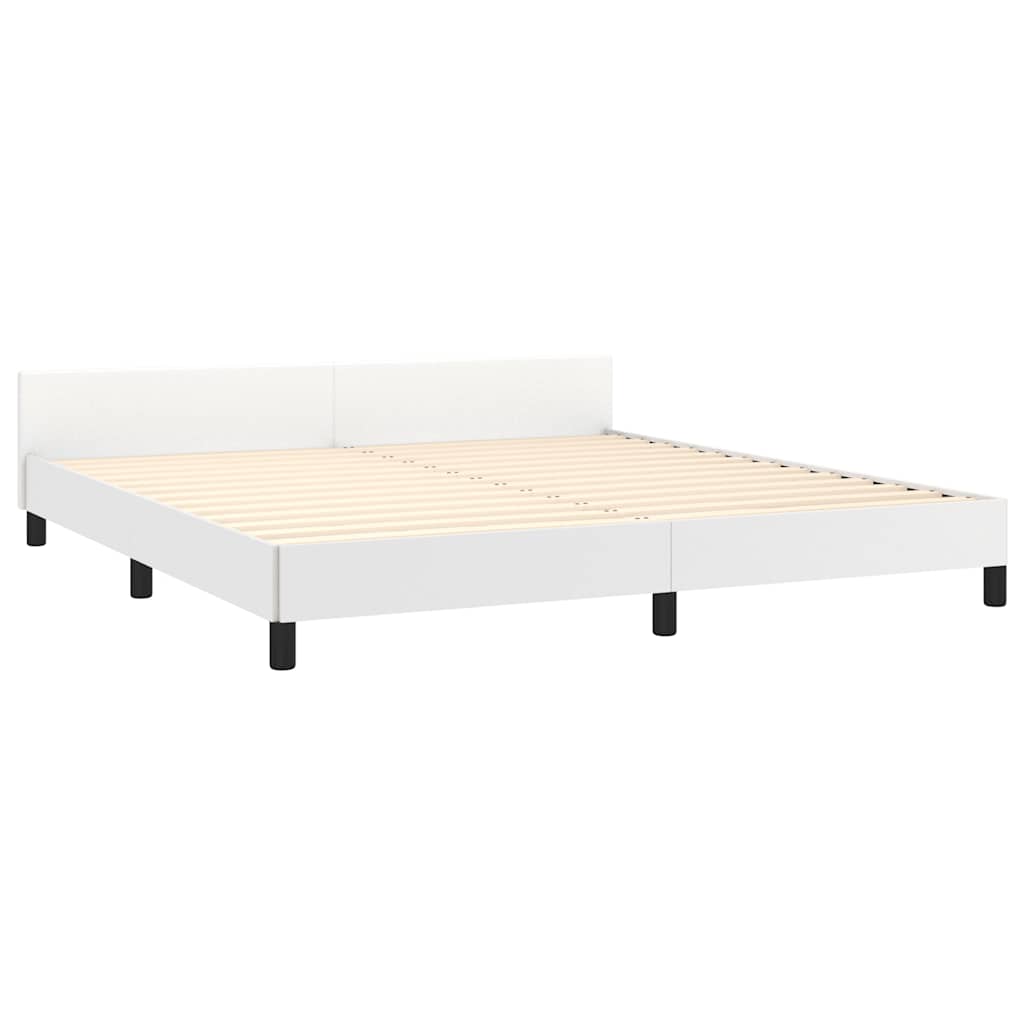 Modern white platform bed frame with black legs and grey bedding