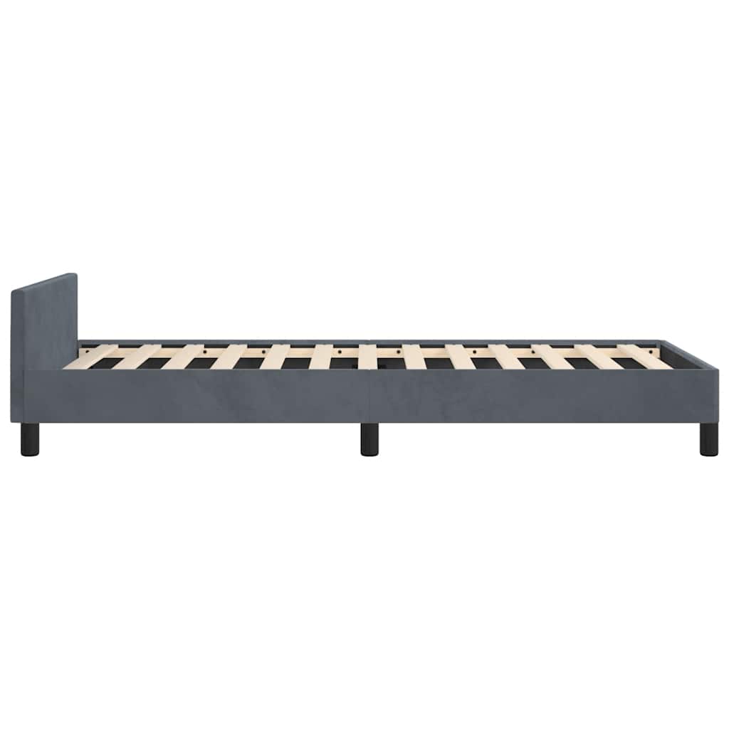 Dark gray upholstered twin bed frame with slatted wooden base