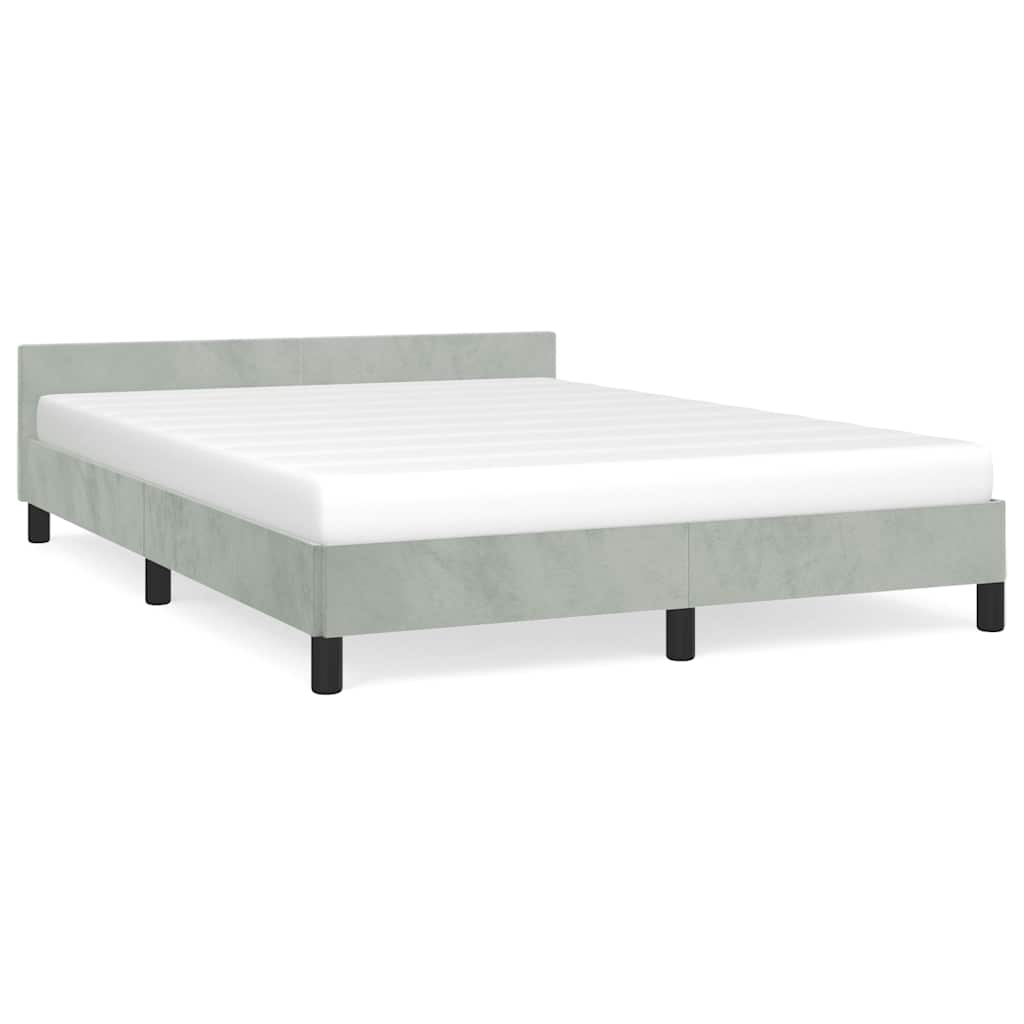 Wooden bed frame with headboard and slatted base showing dimensions